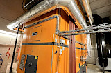 Hot water boiler plant Schmidt 2400 kWth with moving step-grate